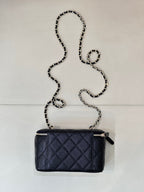 Chanel quilted mini crossbody bag, dark navy, gold-tone zipper and chain strap