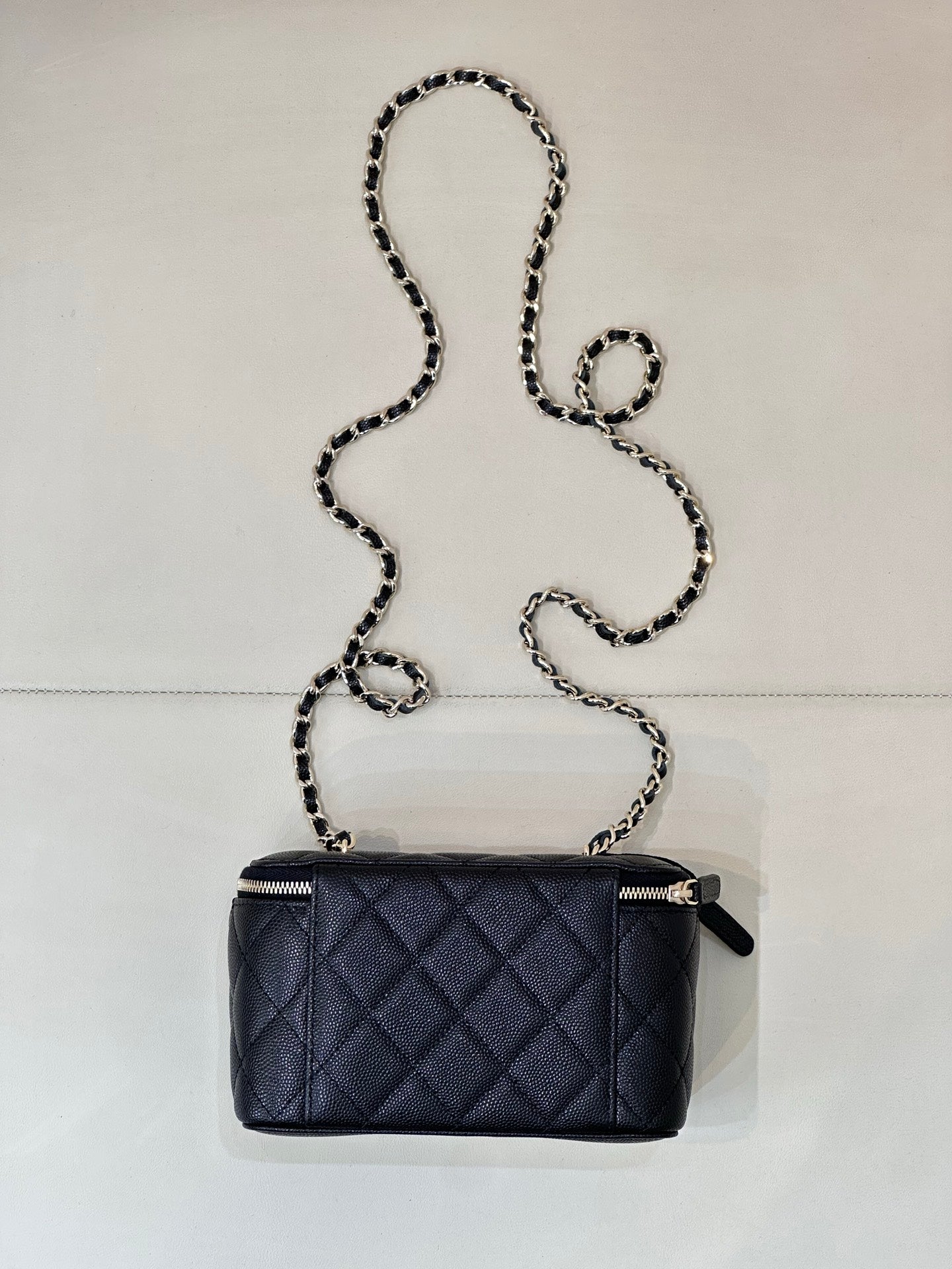 Chanel quilted mini crossbody bag, dark navy, gold-tone zipper and chain strap