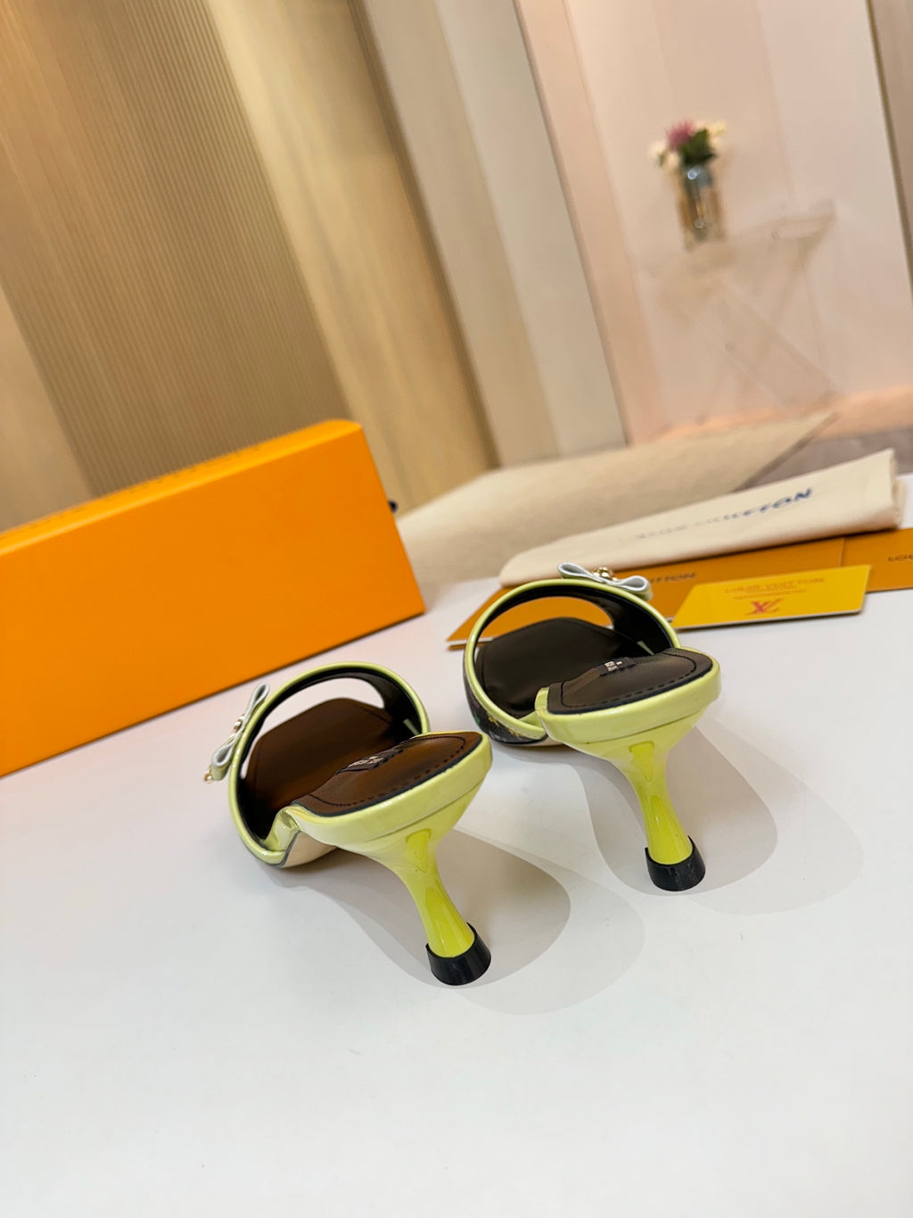 Louis Vuitton ladies mule sandals, multicolor monogram upper with lime green straps and kitten heels