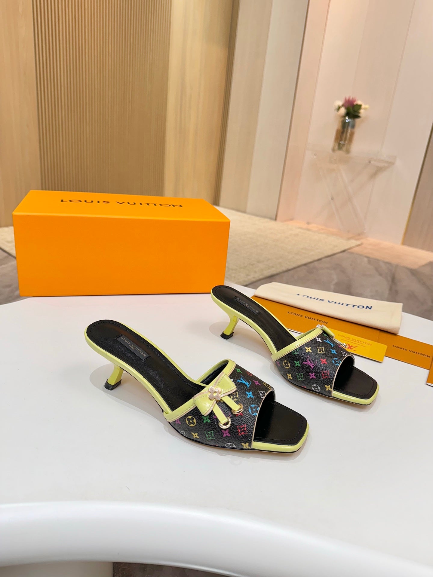 Louis Vuitton ladies mule sandals with multicolor monogram upper and lime green trim, kitten heels