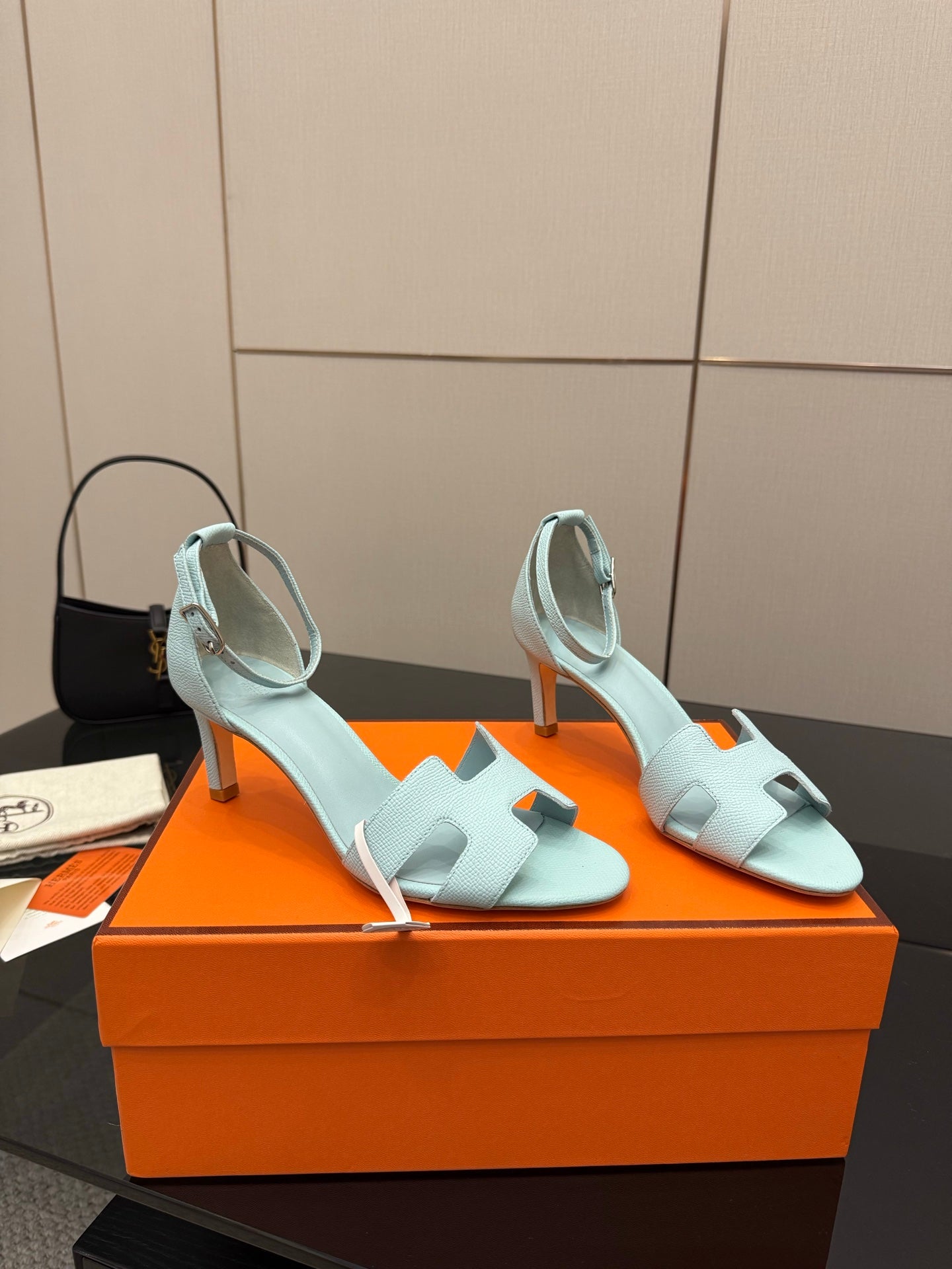 Hermes women's light-blue leather slingback sandals, side view, open toe, high heel