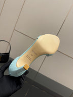 Hermes women's luxury shoes, light blue slingback sandal heel view with tan insole