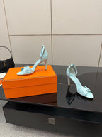 Hermes women's luxury shoes, light blue slingback sandals side view with stiletto heel