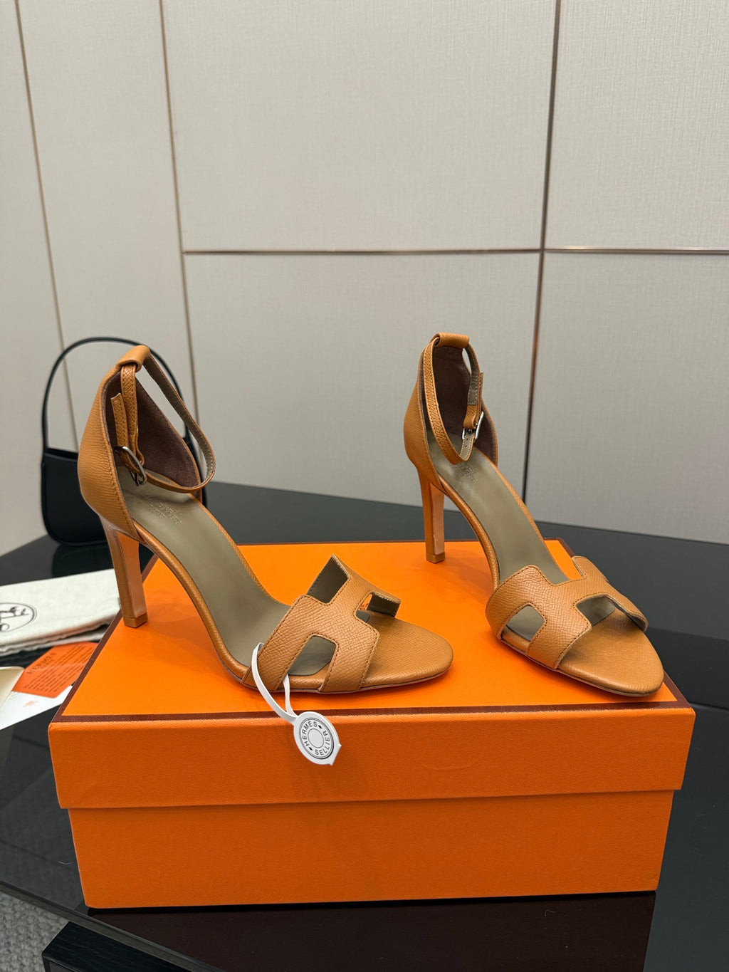Hermes tan leather heeled sandals for ladies, strappy open toe, side view pair