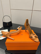 Hermes ladies tan heeled sandals with T-strap straps and open toe