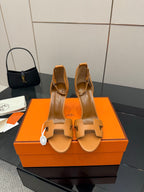Hermes ladies tan slingback heels with T-strap cutouts and high stiletto