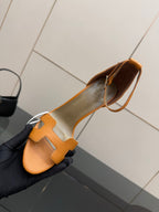 Hermes tan leather heeled sandal for ladies, open toe and ankle strap, close-up top view