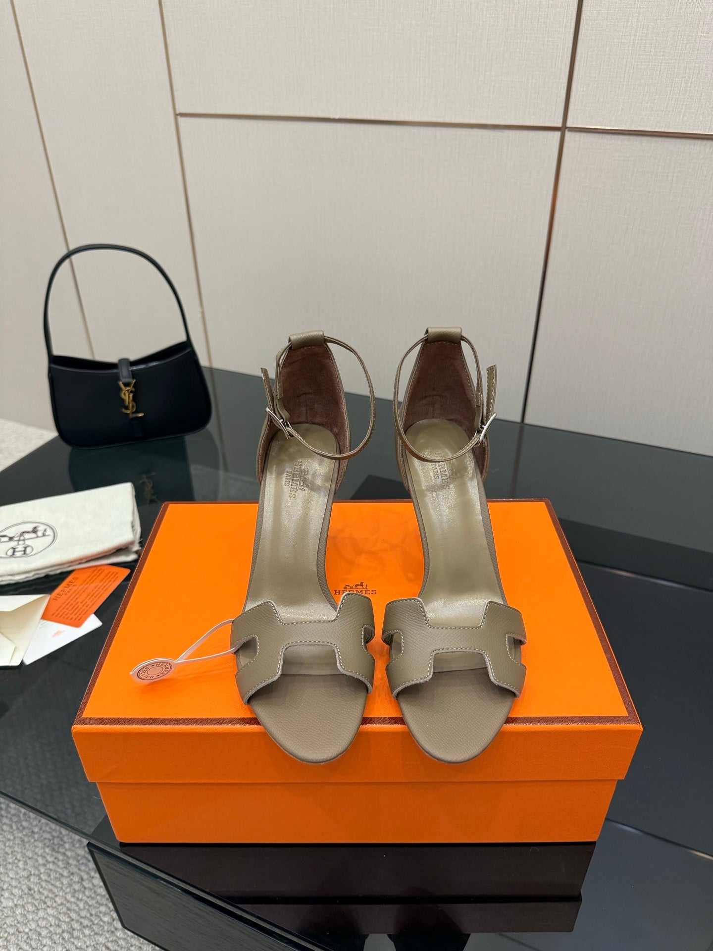 Ladies heeled sandals in light gray with ankle strap and open toe, buckle detail