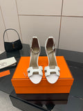 White leather heeled sandals with adjustable strap and block heel