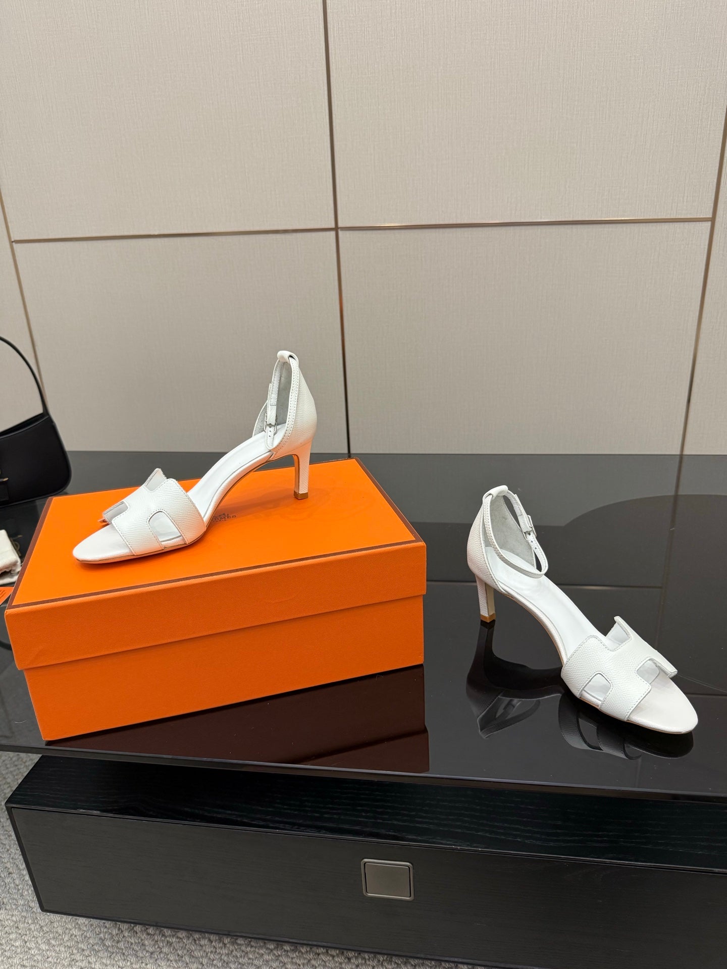 White leather slingback sandals with block heel, side view