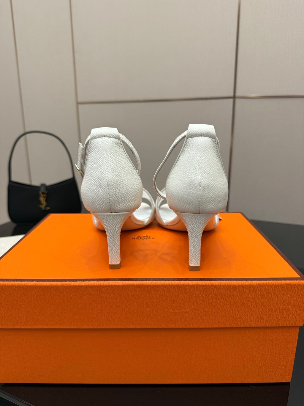 White leather sandals with block heel, back view