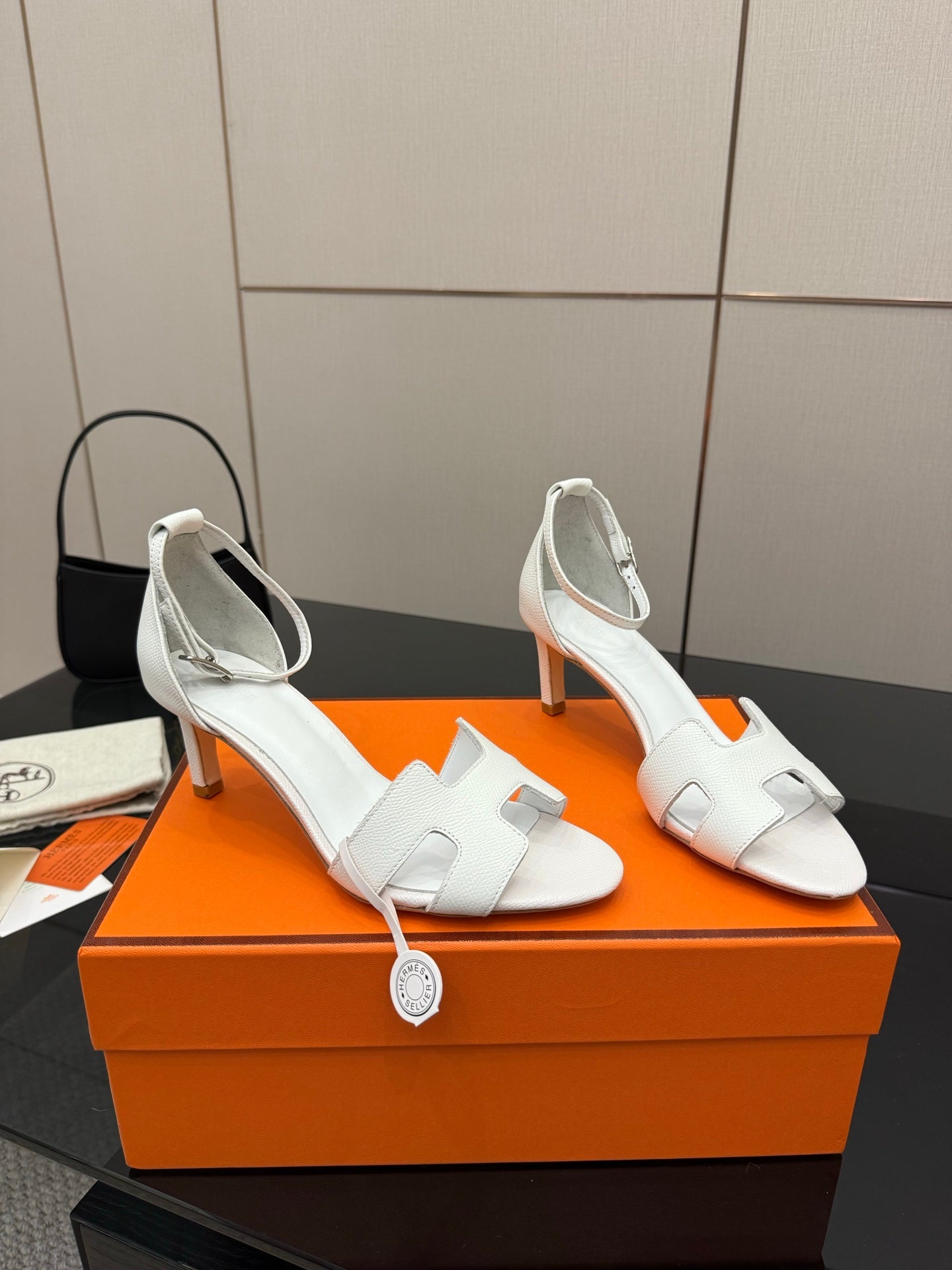 White leather slingback sandals with block heel, side angle