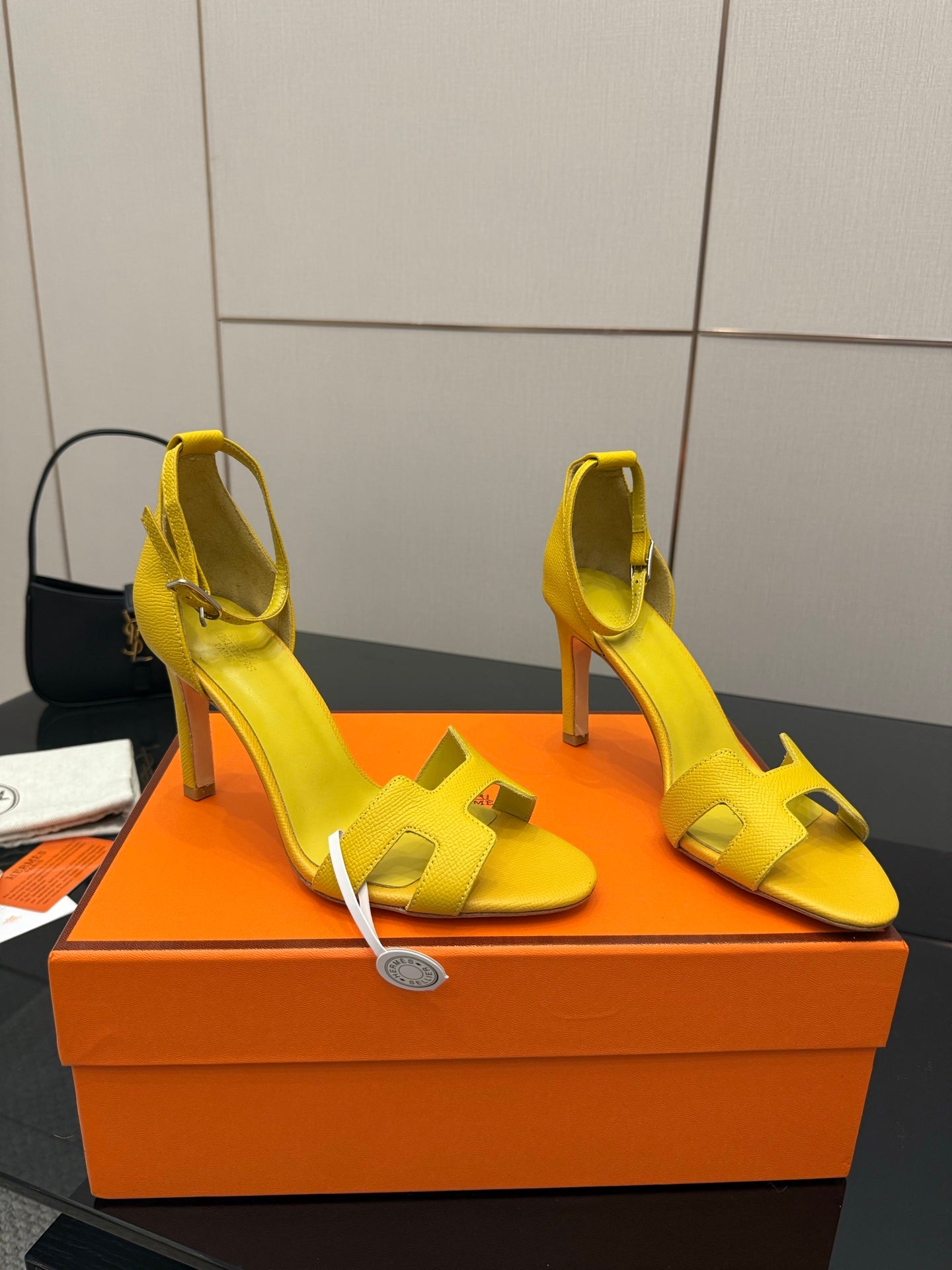 Hermes yellow heeled sandals with ankle strap, side view