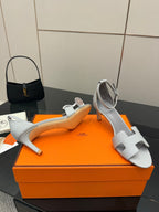Ladies sandals, light gray leather with ankle strap and low block heel