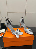 Ladies' light-gray heeled sandals with thin heel and buckle ankle strap