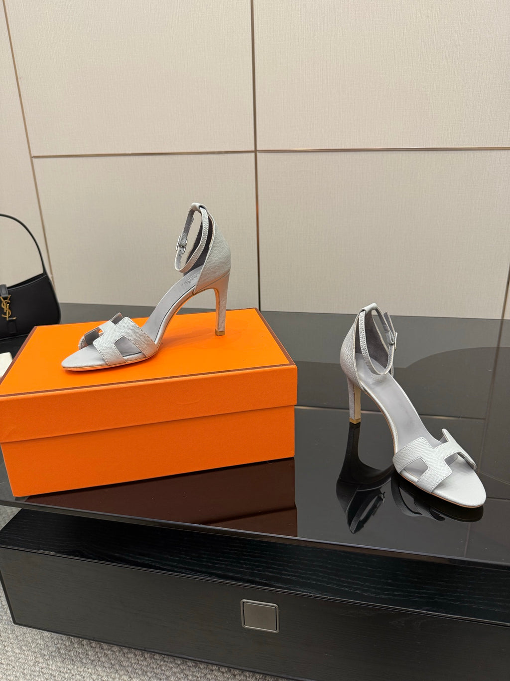 Ladies' light-gray heeled sandals with open toe and ankle strap, side view