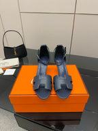 Ladies blue heeled sandals with wide ankle strap and cutout toe