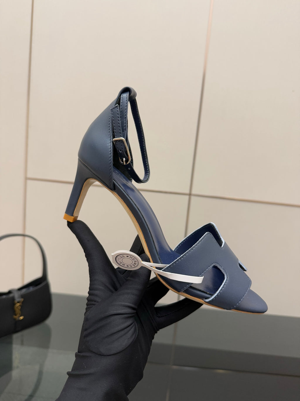 Close-up: ladies blue heeled sandal with open toe and stiletto heel