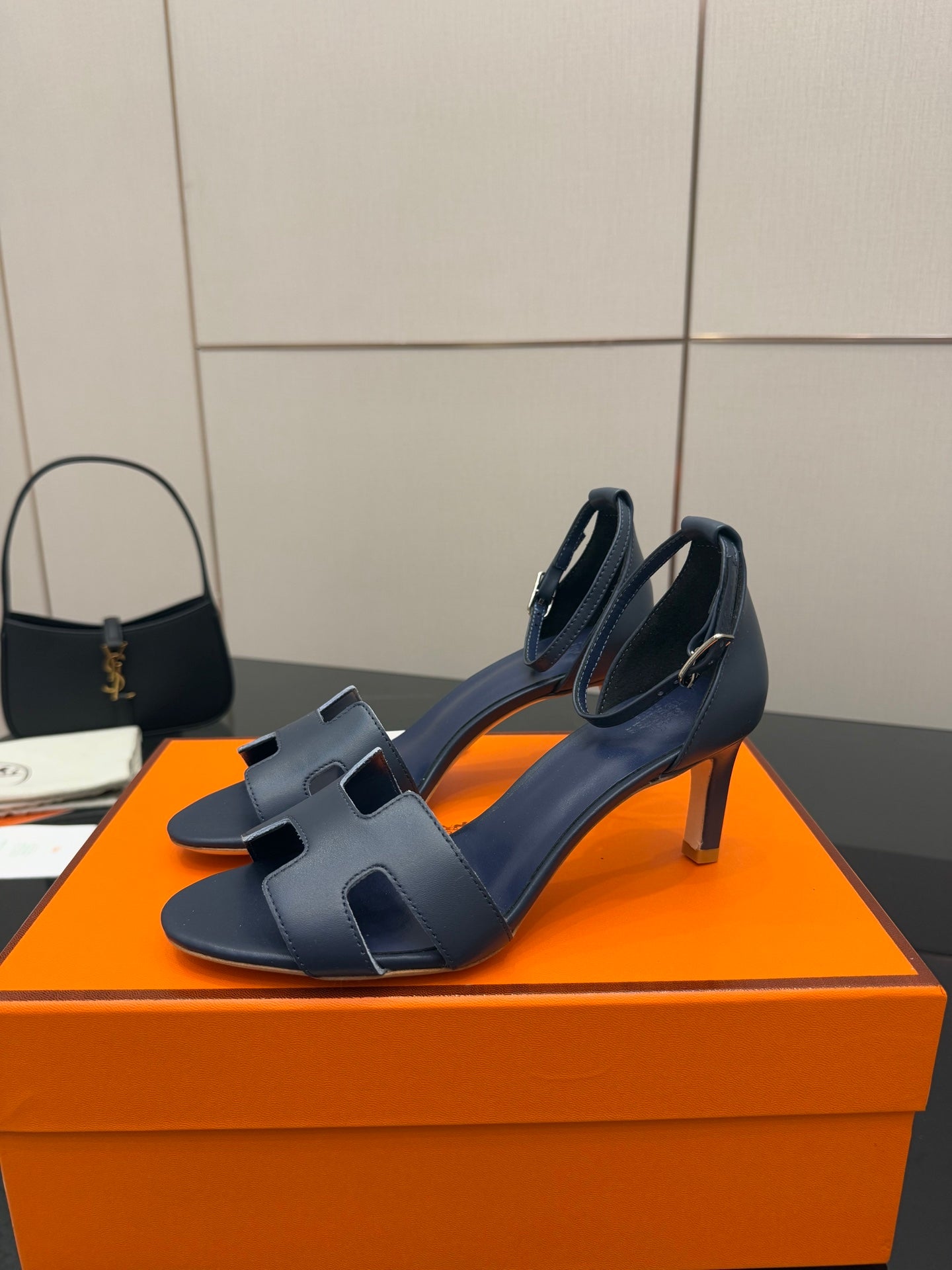 Ladies blue heeled sandals with crisscross straps and open toe
