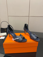 Ladies navy blue heeled sandals with adjustable straps and slim heel