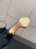 Hermes blue leather heeled sandal showing light insole and rear stiletto heel