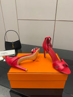 Hermes red heeled sandals with wide straps and open toe, profile view