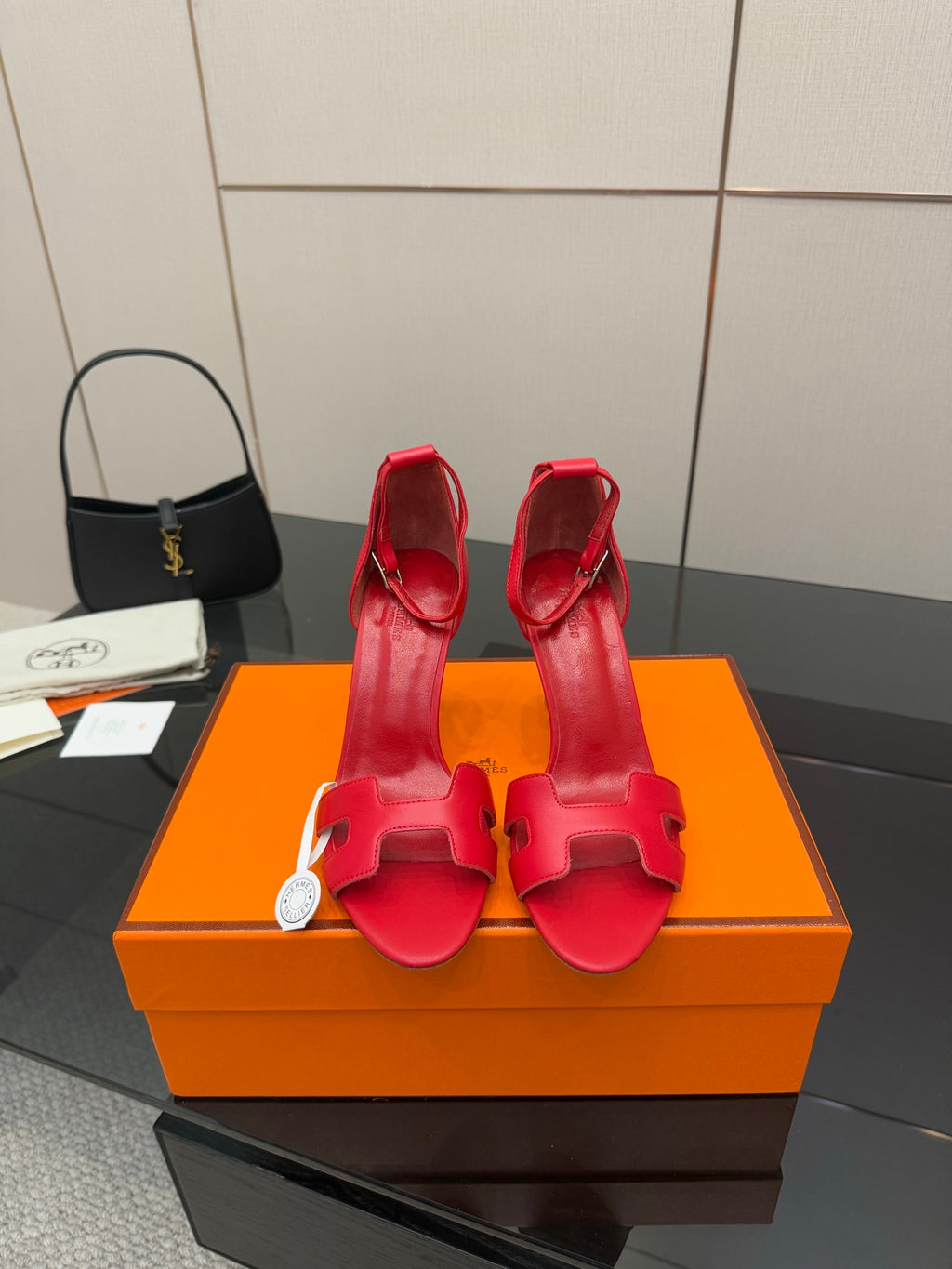 Hermes red strappy heeled sandals with open toe and ankle strap