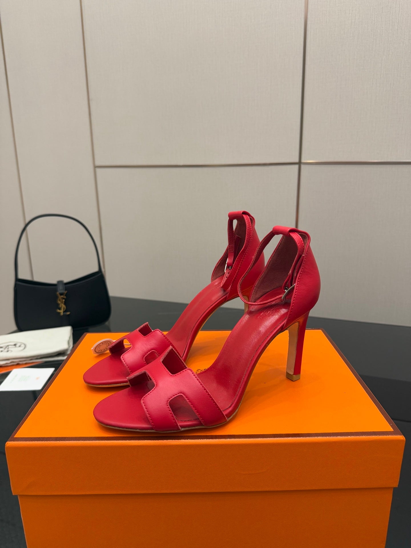 Hermes red heeled sandals with slingback strap and cutout upper