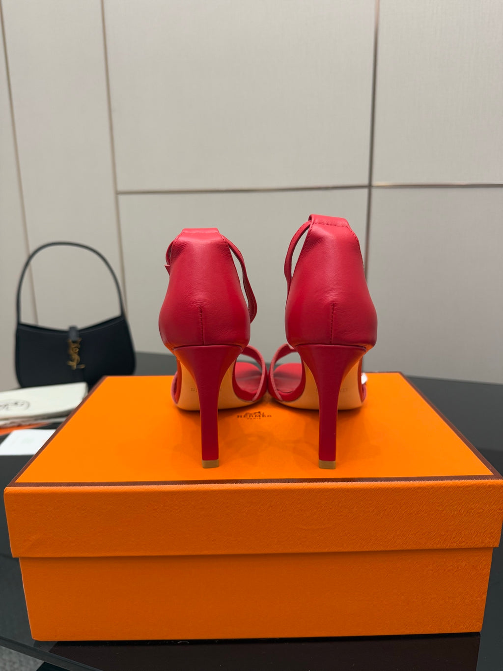 Hermes red heeled sandals, back view with stiletto heel and strap detail