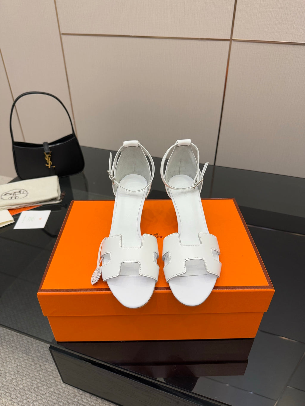 White heeled sandal with ankle strap and cutout strap detail