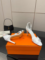 Hermes women's white heeled sandals, pair on orange box, open toe
