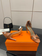 Tan leather heeled sandals, open toe with slingback strap and stiletto heel