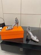 Hermes ladies gray strappy heeled sandals with open toe and tall thin heel