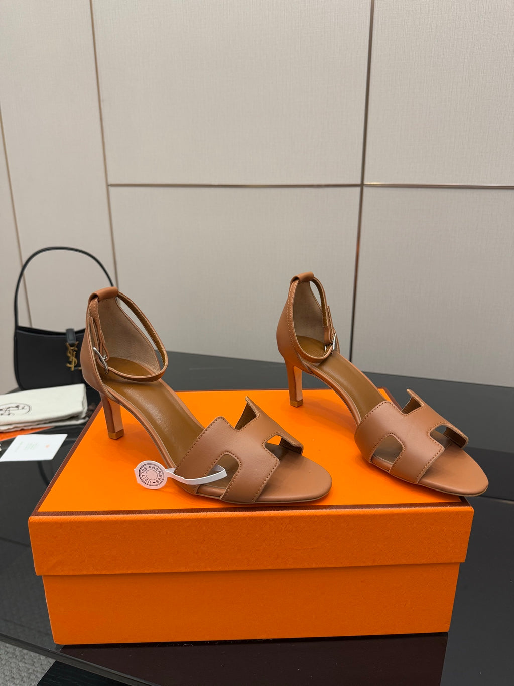 Tan leather heeled slide sandals with ankle sling and open toe