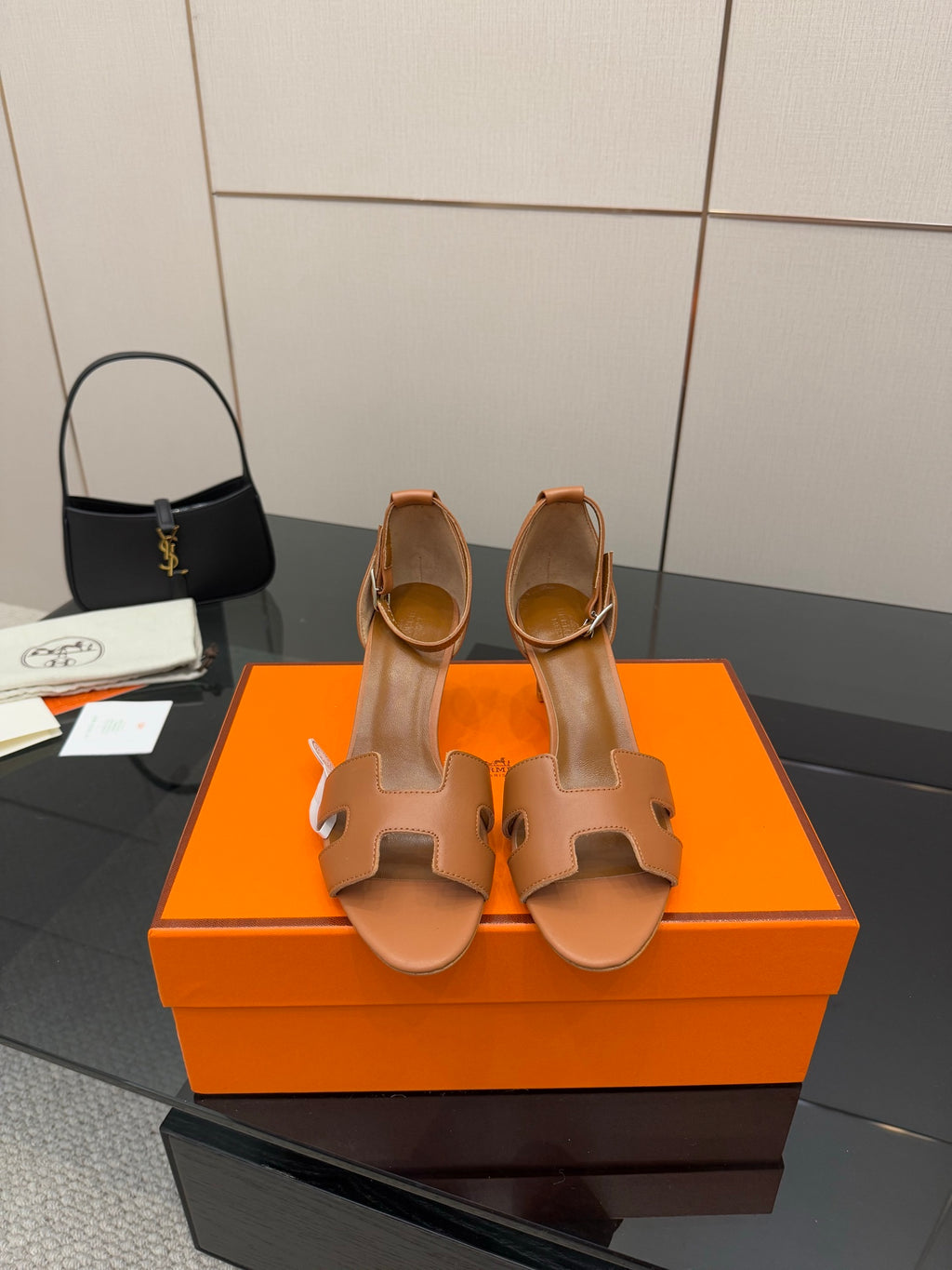 Tan leather heeled sandals with open toe and H-cutout strap detail