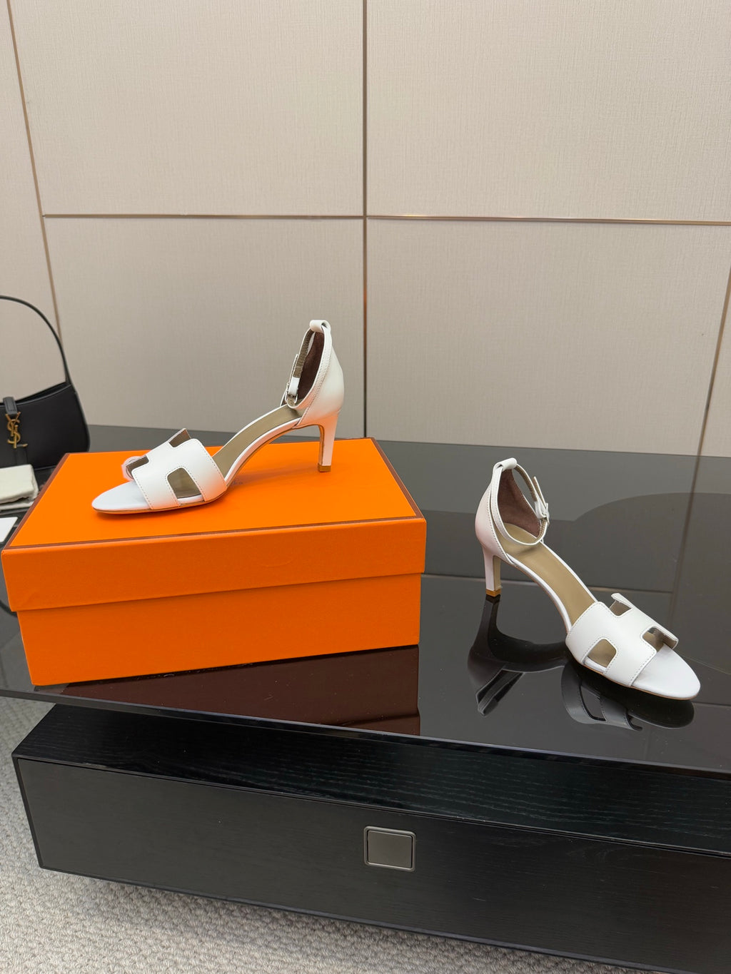 Hermes white leather heeled slingback sandals with open toe and adjustable strap