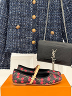 Women's black cherry-print flats with gold studded strap and rounded toe