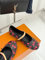 Women's black cherry-print flats with gold studded strap and flat sole