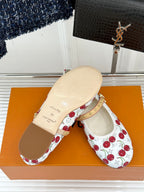 Louis Vuitton cherry-print flats with tan sole and gold studded strap