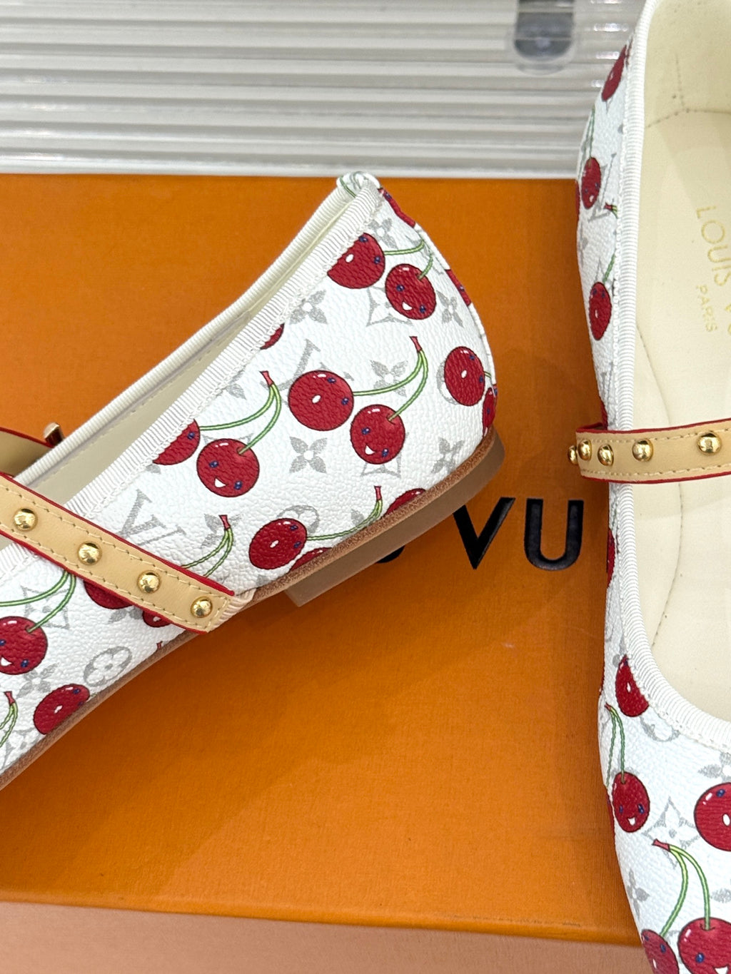 Louis Vuitton cherry-print slip-on flats with tan studded strap
