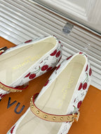 Louis Vuitton cherry-print flats with tan studded strap and cream lining