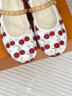 Louis Vuitton cherry-print ballet flats with tan studded straps, stitched panels