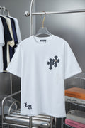 White short-sleeve T-shirt with dark cross graphic on chest