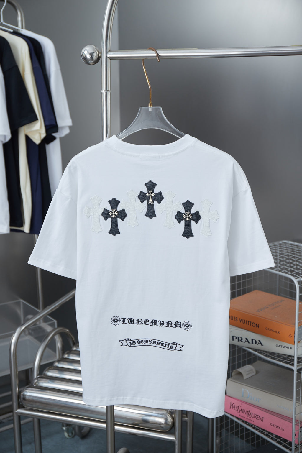 White short-sleeve T-shirt with dark cross graphic cluster on back