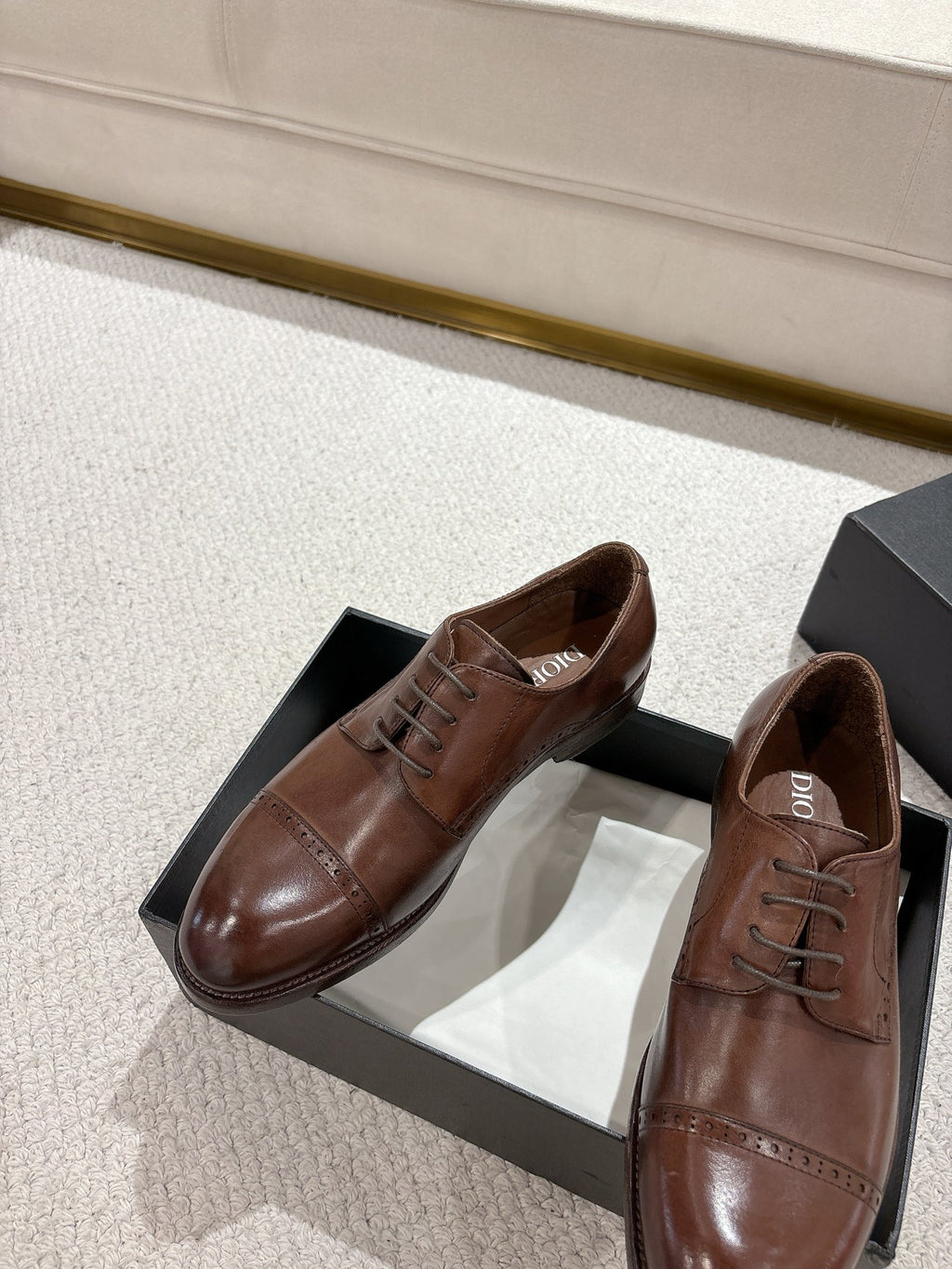 Brown leather lace-up dress shoes in black box, pointed toe