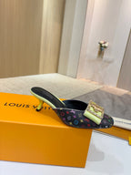 Ladies mules with monogram canvas, gold buckle strap, neon green sole trim