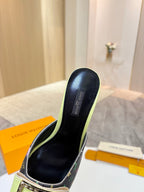 Ladies mule heel interior view with neon green edge and gold buckle strap