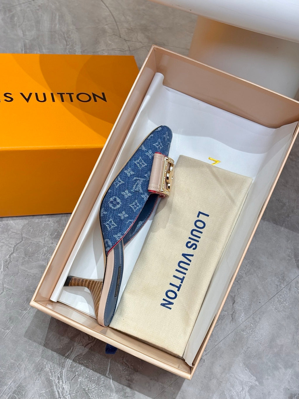 Women's blue monogram mule shoes in gift box with branded dust bag