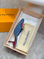 Blue monogram heeled mule in box with gold buckle and burgundy heel lining