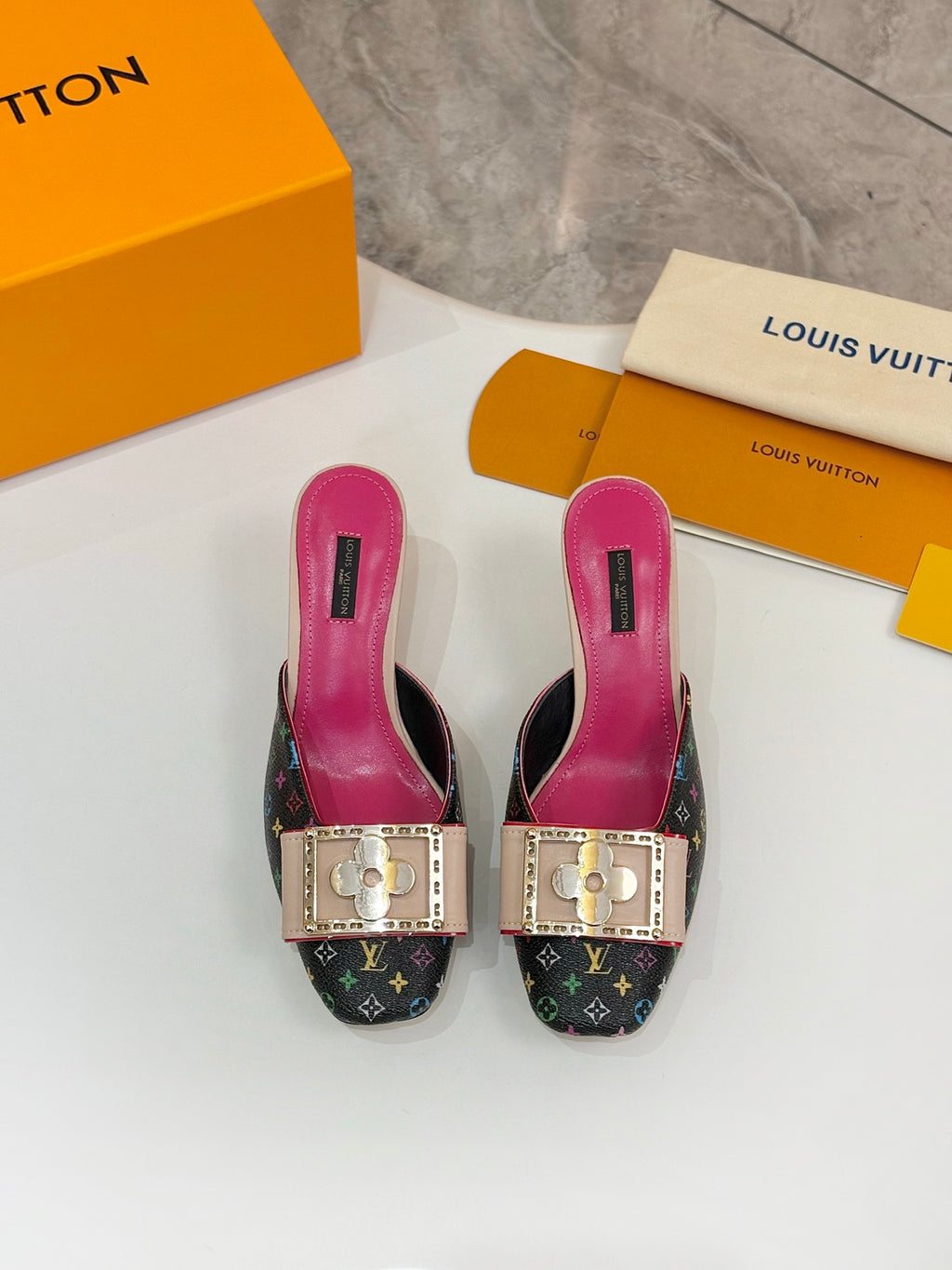 Louis Vuitton ladies shoes mule pair with pink insoles and front gold buckle strap detail